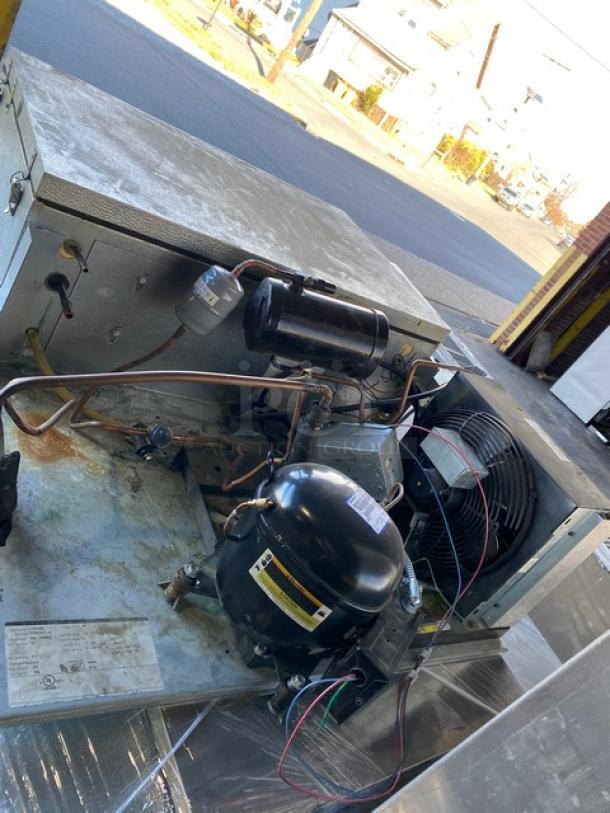 Norlake CPB075DC-A 6' x 6' walk-in cooler with floor and self-contained compressor/condenser, requires hookup. Serial 11081455.