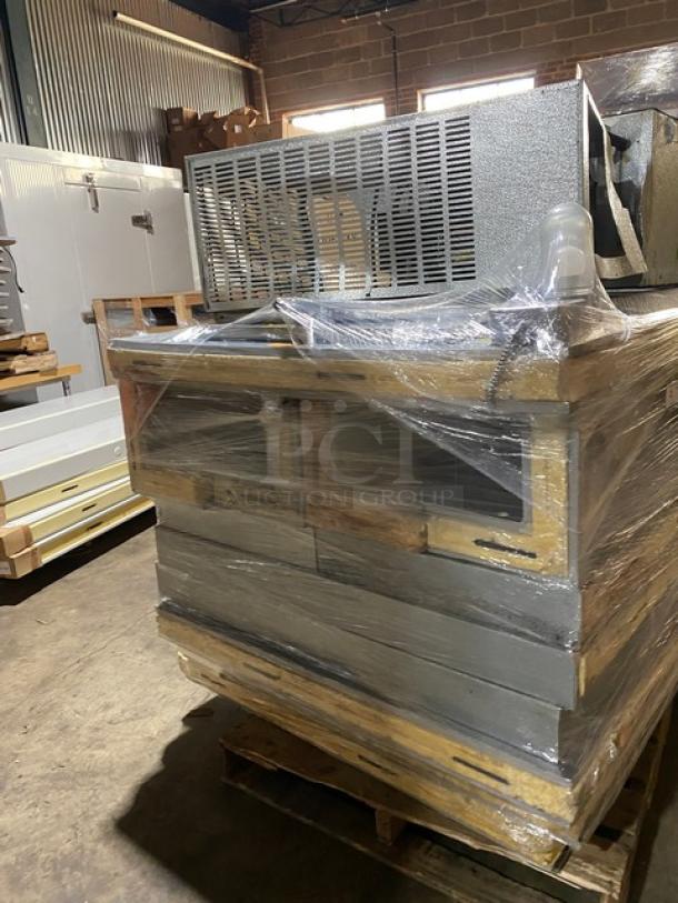 Norlake CPF100DC-A 6' x 6' walk-in freezer with floor and self-contained compressor. Serial 11081391, 208/230V, 1-phase.