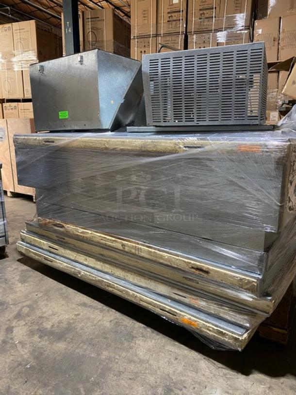 Norlake 6' x 6' walk-in freezer, model CPF100DC-A, with self-contained compressor. Appears in good condition.