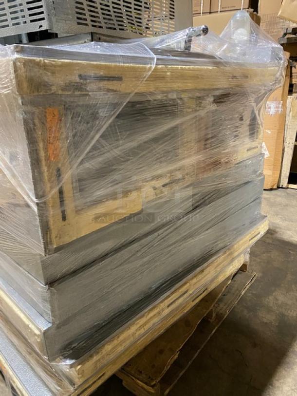 Norlake 6' x 6' walk-in freezer, model CPF100DC-A. Heavy-duty, with floor, self-contained compressor/blower. Wrapped on pallet.