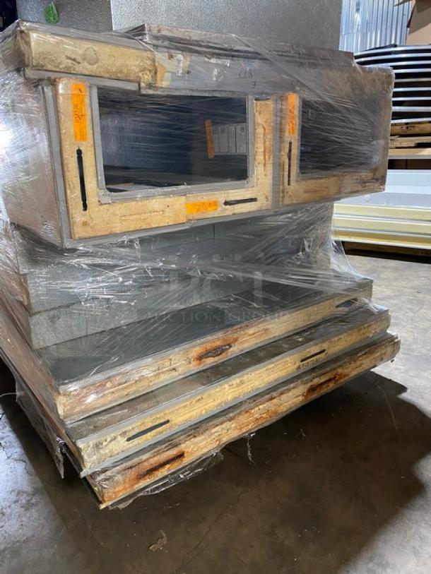 Norlake 6'x6' walk-in freezer, model CPF100DC-A. Includes self-contained compressor/blower. Wrapped and packaged.