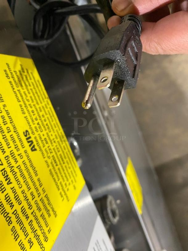 Woodstone 36" flat griddle model WSGPL3636CT01NG, natural gas, stainless steel, with back and side splashes, 120V plug.