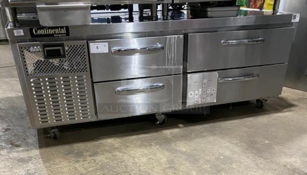 Stainless steel Continental refrigerated work/prep table, 4 drawers, serial 16249154, 115V 1 Phase, on commercial casters.