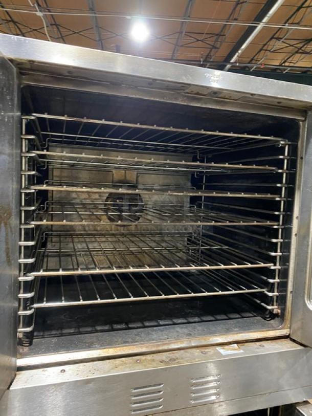 Garland Master 200 convection oven, double stacked, stainless steel with view-through doors and commercial casters.