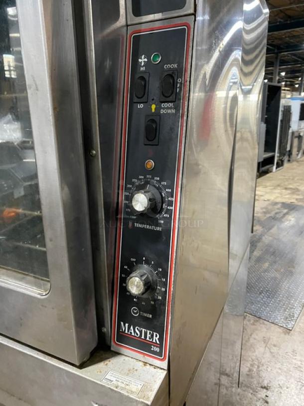 Garland Master 200 double-stacked convection oven, natural gas, stainless steel, view-through doors, on commercial casters.