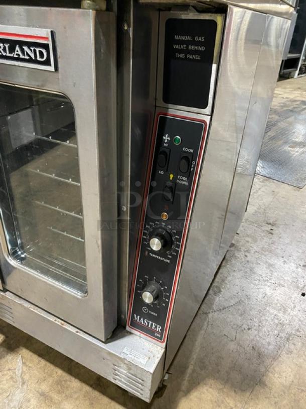 Garland Master 200 Series commercial convection oven, double stacked, stainless steel, natural gas, view-through doors, on casters.