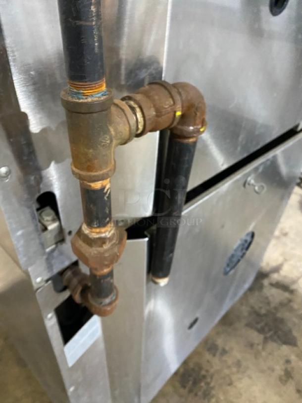 Garland Master 200 stainless steel double-stacked convection oven, natural gas powered, with view-through doors and casters.