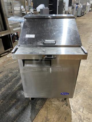 Atosa 27" refrigerated prep table, model MSF8305GR. Features single door storage, mega top, on casters, stainless steel.