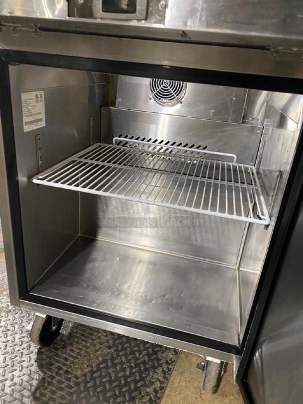 Atosa MSF8305GR 27" refrigerated prep table, open door showing interior shelf, stainless steel, on casters, 115V.