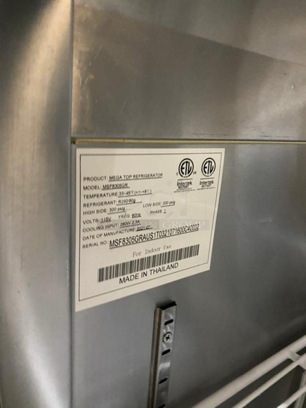 Atosa MSF8305GR Mega Top Refrigerator label showing model, serial number MSF8305GRAUS1T0321071600C40032, and specs.