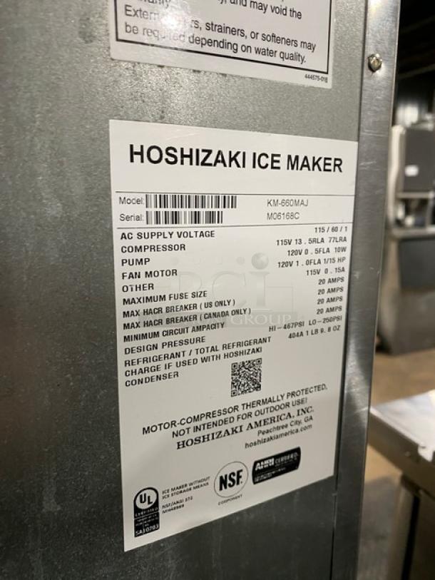 Hoshizaki commercial ice maker, Model KM660MAJ, stainless steel, serial M06168C, 115V, 1 phase, label details visible.