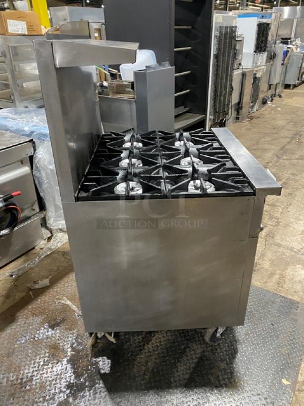 Sunfire X366R 6-burner stainless steel range/oven combo with raised backsplash, overhead salamander shelf, and commercial casters.