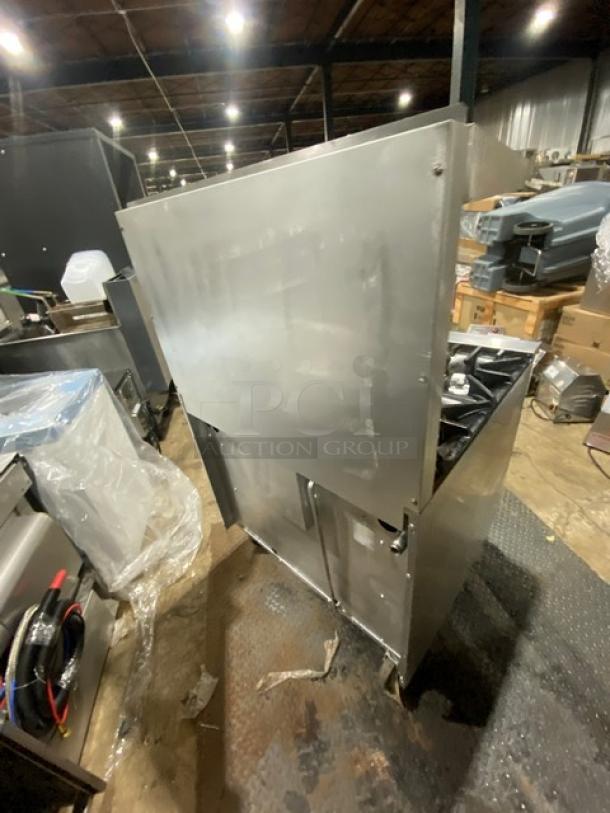 Sunfire X366R stainless steel 6-burner range/oven combo with raised backsplash and overhead salamander shelf, on casters.