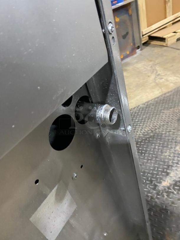 Sunfire X366R back view showing gas connection. Stainless steel construction with visible industrial setting.