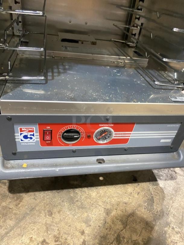 Metro C5 Series heated holding cabinet, model C539-H-DD8890-U, with two half doors, 120V, on commercial casters.