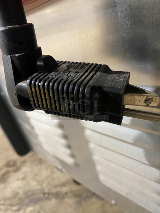 Close-up of Metro C539-H-DD8890-U insulated cabinet plug. Features two half doors, commercial casters; 120V.