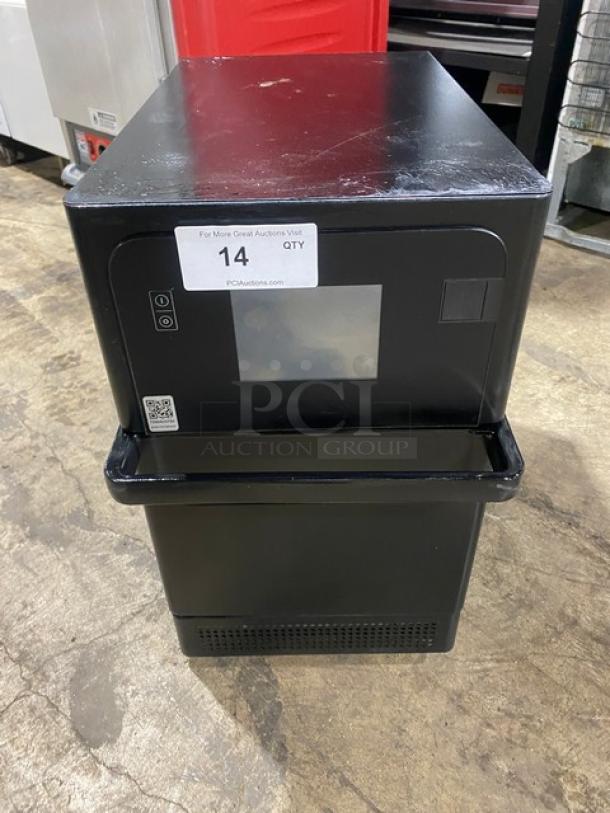 MerryChef Eikon E2S countertop rapid cook oven, black, electric, 208/240V 1 phase, excellent condition, label visible.