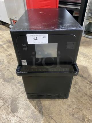 MerryChef Eikon E2S countertop rapid cook oven, black, electric, 208/240V 1 phase, excellent condition, label visible.