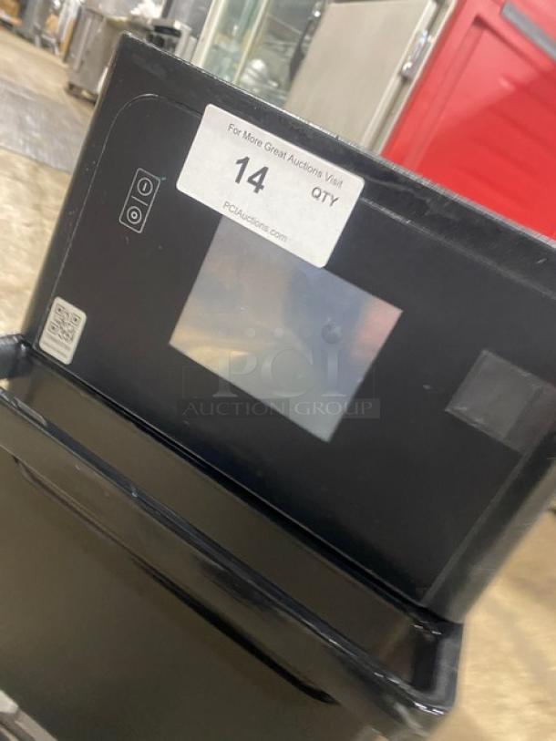 MerryChef Eikon E2S electric countertop rapid cook oven, black, 208/240V, 1 phase, good condition. Auction label indicates "14 QTY."