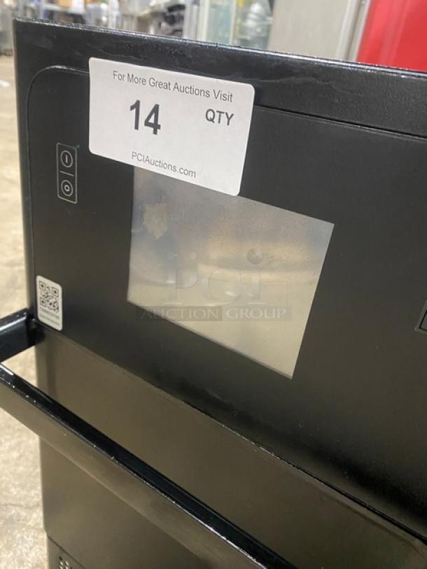 MerryChef Eikon E2S electric countertop rapid cook oven, black, 208/240V, single phase, good condition, auction tag visible.