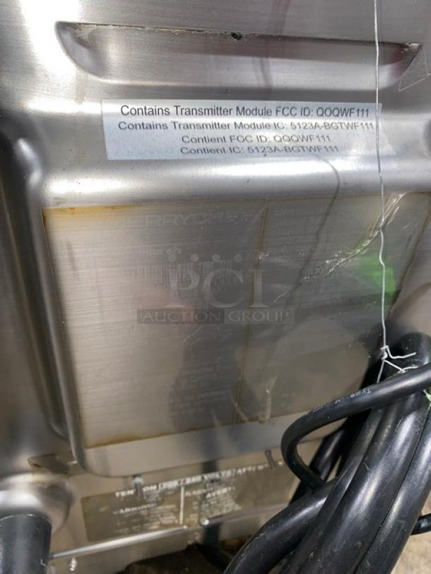 MerryChef Eikon E2S rapid cook oven, stainless steel body, visible labels with FCC ID: OQO-WF111, 208/240V 1 Phase.