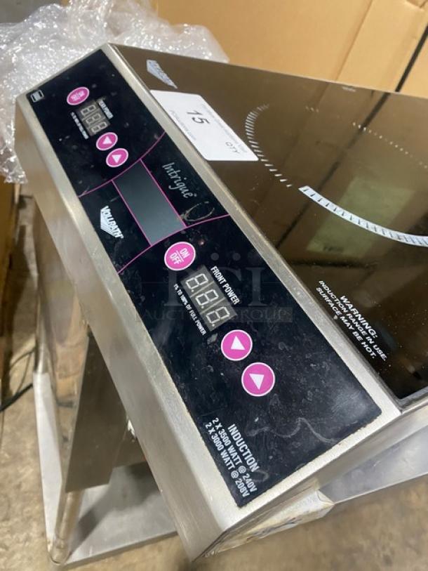 Vollrath 69507 Intrigue Series dual burner induction range, features digital controls and 208/240V power, in used condition.