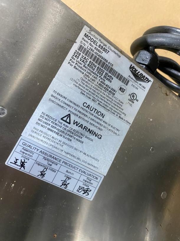 Vollrath Induction Range Model 69507, serial L25000489059012; label shows 208/240V, certifications, and safety warnings.