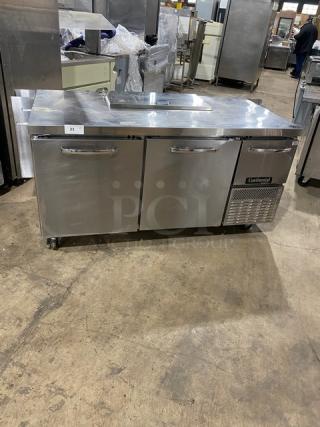 Continental refrigerated sandwich prep table, model RA68N8, stainless steel, 2.5 doors, under storage, 115V, serial 162B9697.