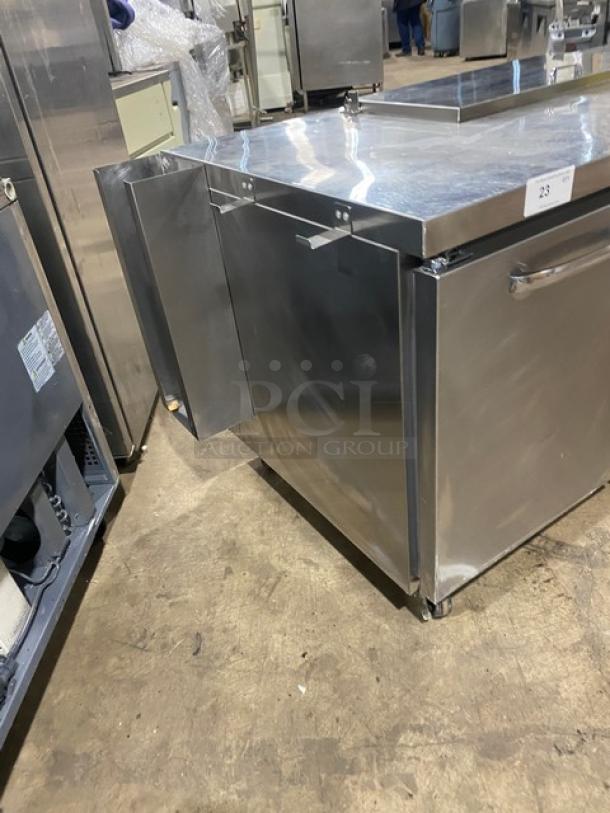 Continental RA68N8 stainless steel refrigerated sandwich prep table with 2.5 doors, features under storage, Model RA68N8, Serial 162B9697.