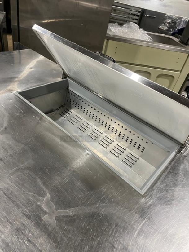Stainless steel Continental refrigerated sandwich prep table with open compartment, model RA68N8, excellent condition.