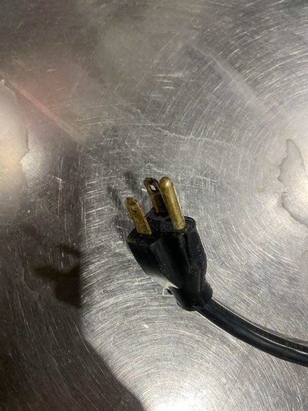 Vollrath Cayenne T43R stainless steel electric food warmer plug, 120V, shown on a metal surface, in good condition.