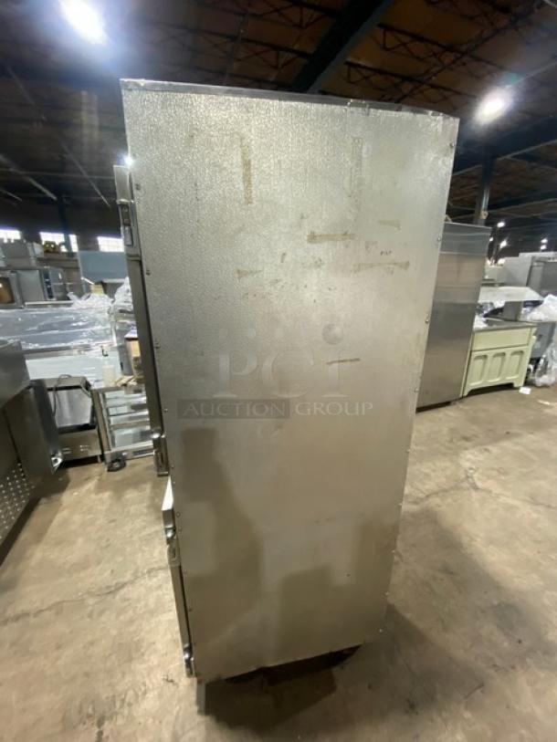 Alto Shaam Model 1000UP stainless steel mobile heated food holding cabinet with dual Dutch doors, electric-powered.