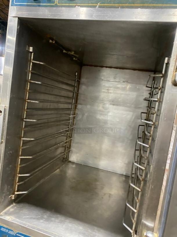 Alto Shaam Model 1000UP stainless steel heated food holding cabinet, dual Dutch doors, electric, used.