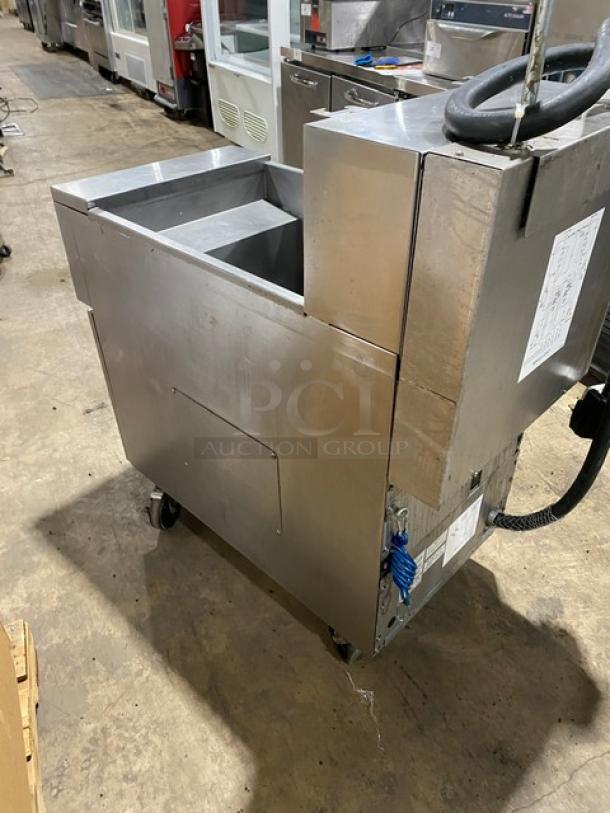 Frymaster FilterQuick Series commercial electric fryer, model 1FQE80U0ZQTZB17, stainless steel, with touch screen, filtration system, on casters.