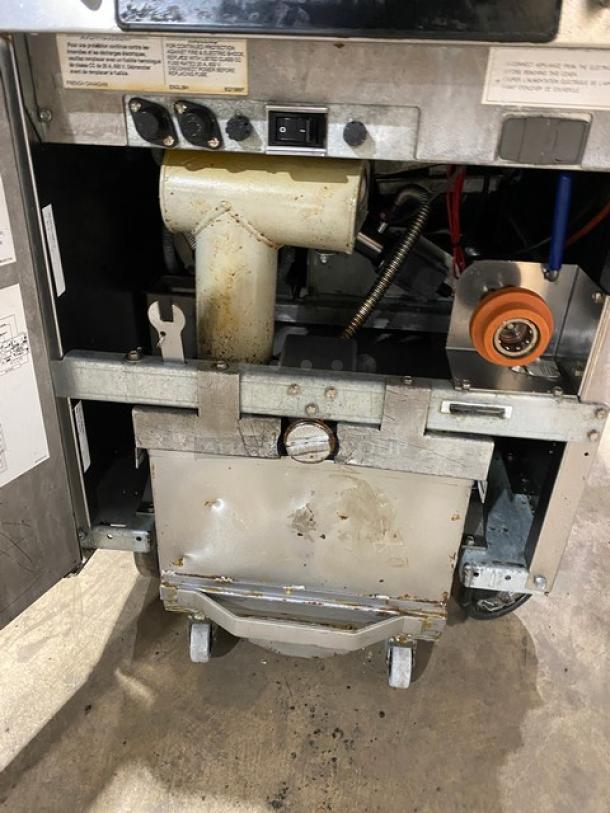 Frymaster FilterQuick fryer, model 1FQE80U0ZQTZB17, in stainless steel, features touch screen control, filtration system, and casters.