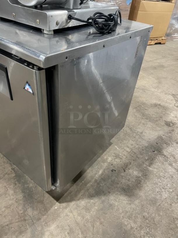 Everest ETR2 commercial lowboy/prep table in stainless steel with two-door storage, poly coated racks, on casters.