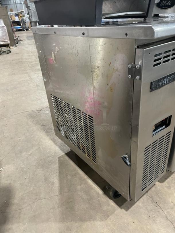 Everest ETR2 stainless steel lowboy/prep table with 2-door storage, poly-coated racks, on casters. Model: ETR2, Serial: BTR214030012.