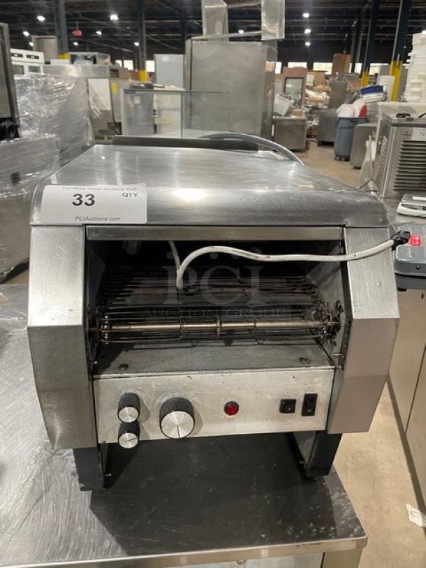 Hatco Toast-Qwik stainless steel electric countertop conveyor toaster in used condition, visible controls, model number unknown.