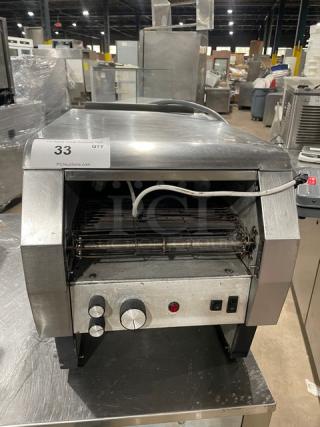 Hatco Toast-Qwik stainless steel electric countertop conveyor toaster in used condition, visible controls, model number unknown.