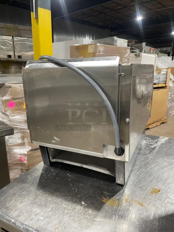 Hatco Toast-Qwik stainless steel electric countertop conveyor toaster in good condition, visible power cord attached.