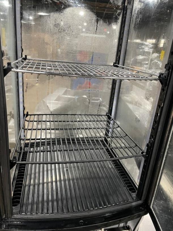 Winco CRD1K refrigerated display case with glass all around, three shelves, 110/120V, excellent condition.
