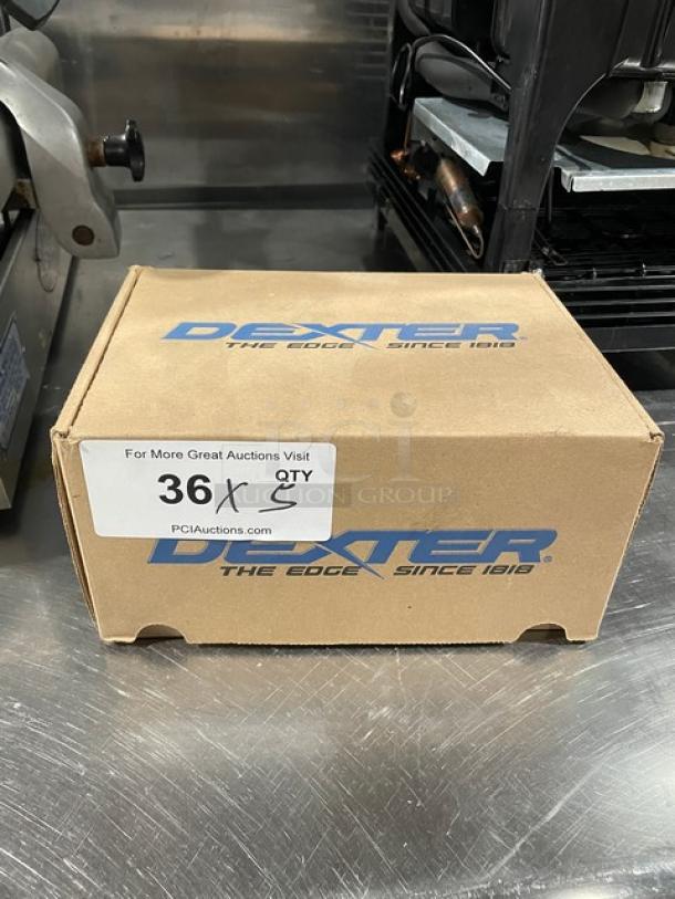 Dexter 2 3/4" Traditional Pizza Cutter, new in box, auction lot of 5. Box labeled with auction details.