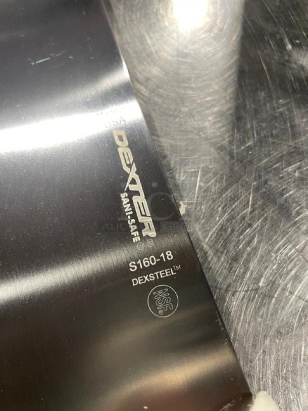 Dexter S16018 18" carbon steel pizza knife, brand new. Features DEXSTEEL™, SANI-SAFE® logo, and NSF marking.