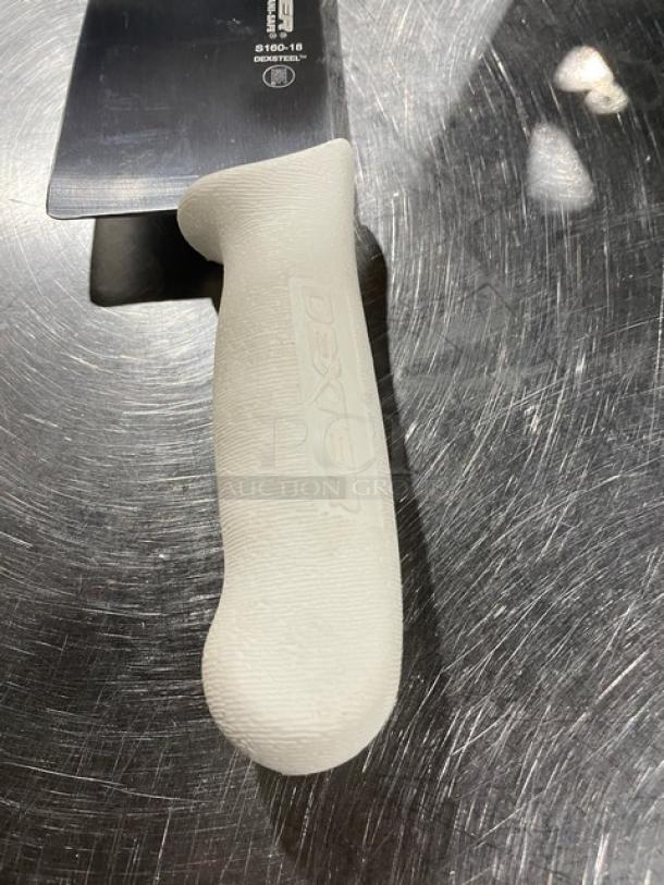 Dexter 18" carbon steel pizza knife, model S16018, showing a white textured handle and blade markings. Brand new condition.