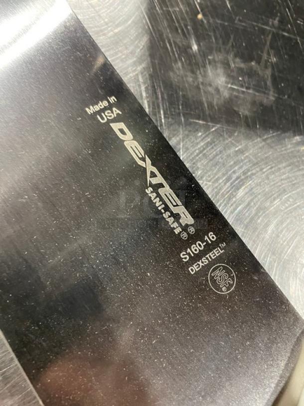 Dexter S16016 commercial 16" carbon steel pizza knife, new. Markings: "Made in USA," "Dexter," "Sani-Safe," "S160-16," "DEXSTEEL." NSF certified.