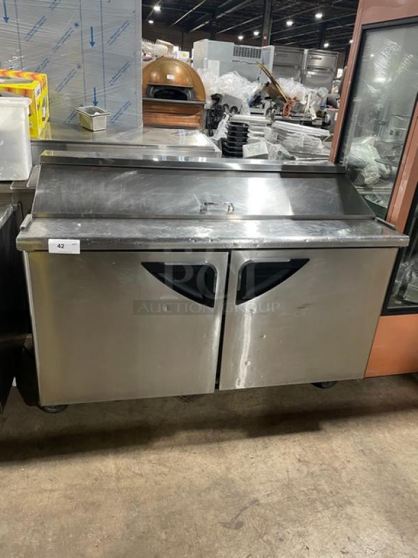 Turbo Air TST60SD commercial refrigerated prep table with 2-door storage, all stainless steel, 115V 1Phase, on casters.