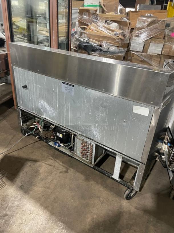 Turbo Air TST60SD refrigerated prep table, stainless steel, with 2-door storage, on casters, 115V 1Phase, commercial use.