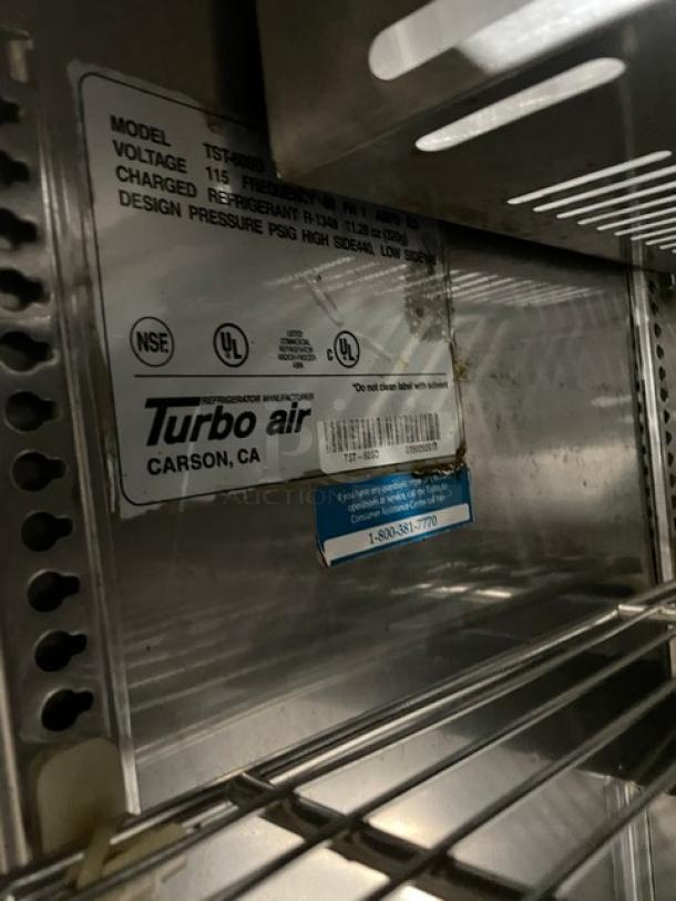 Turbo Air TST60SD commercial refrigerated sandwich/salad prep table, stainless steel, 2-door storage, on casters, 115V.