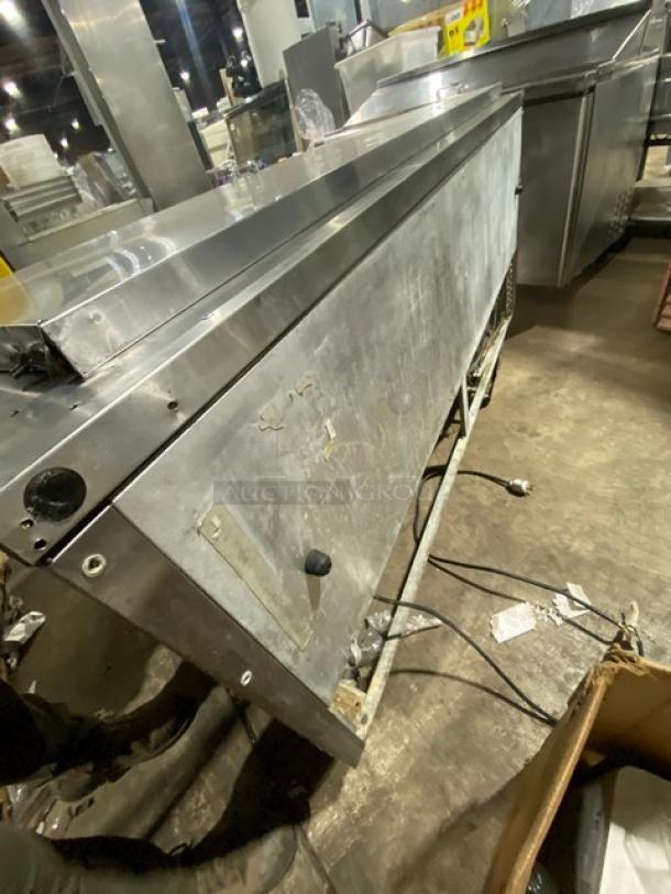 True Commercial Refrigerated Pizza Prep Table, model QA7230MB, stainless steel, with three-door storage. Serial 14509450.