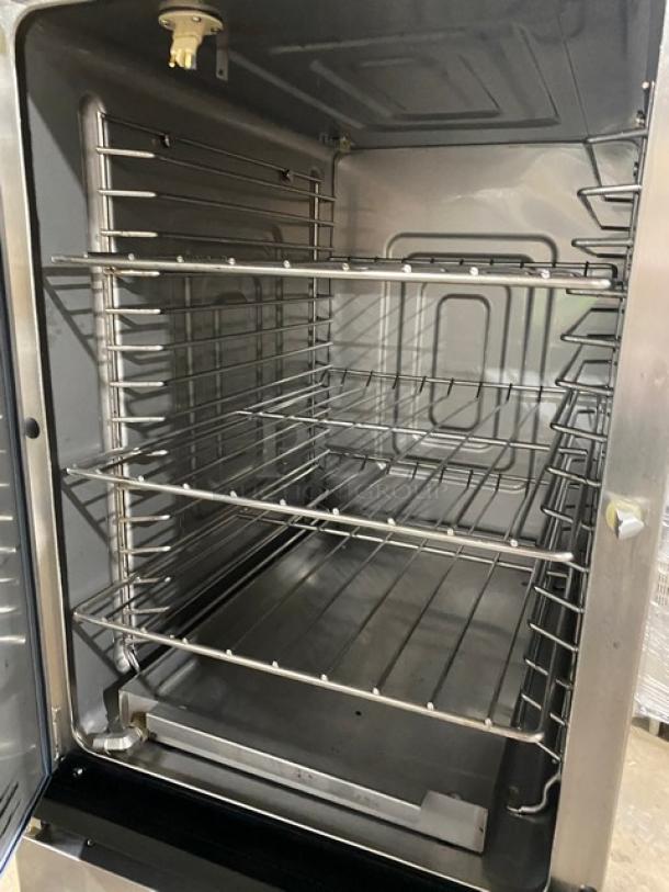 Alto Shaam 1200TH Cook-N-Hold oven, stainless steel, electric, 2 half doors, commercial casters, serial 32078831.